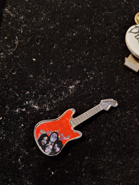Status quo guitar badge