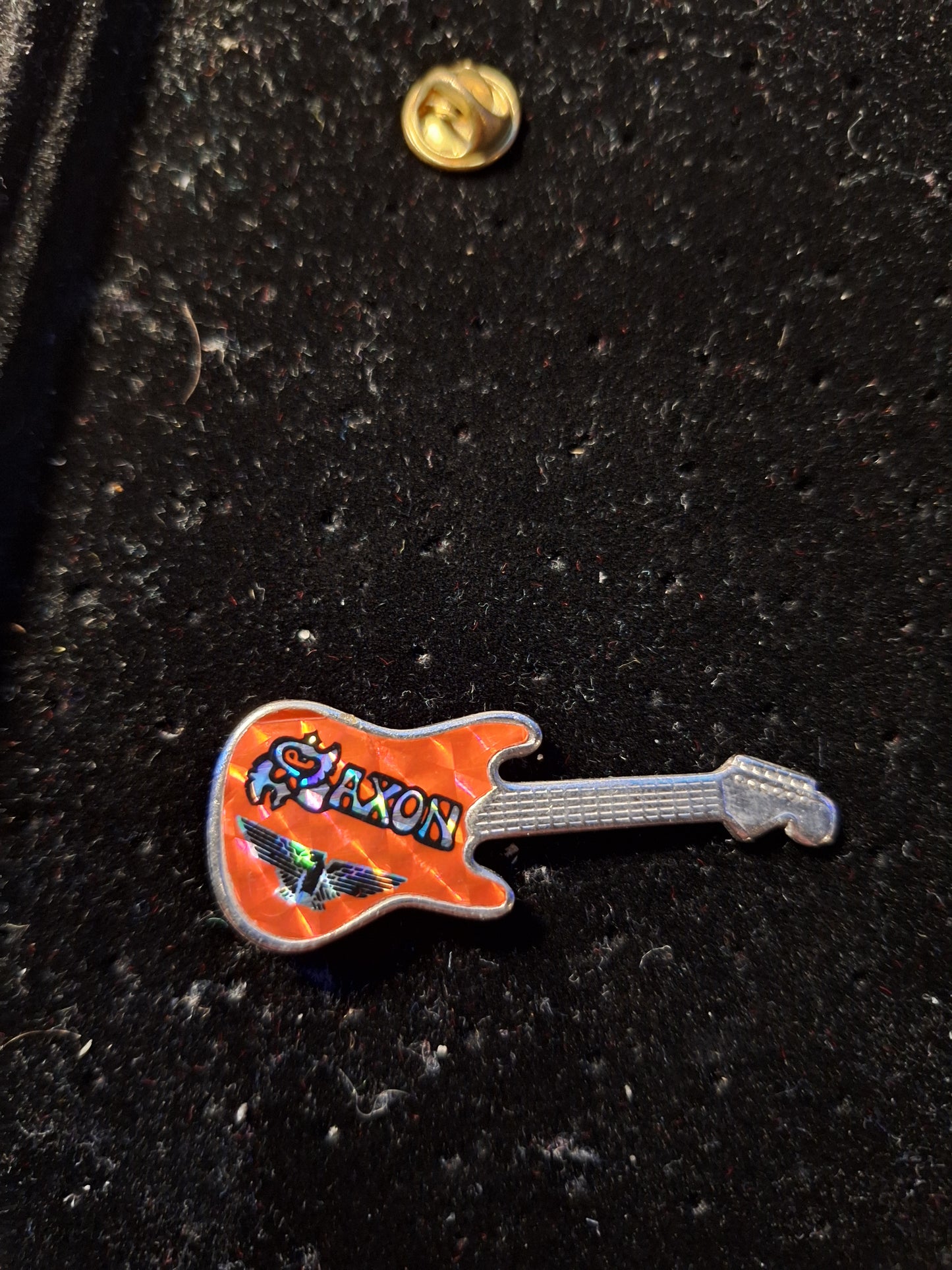 Saxon guitar badge