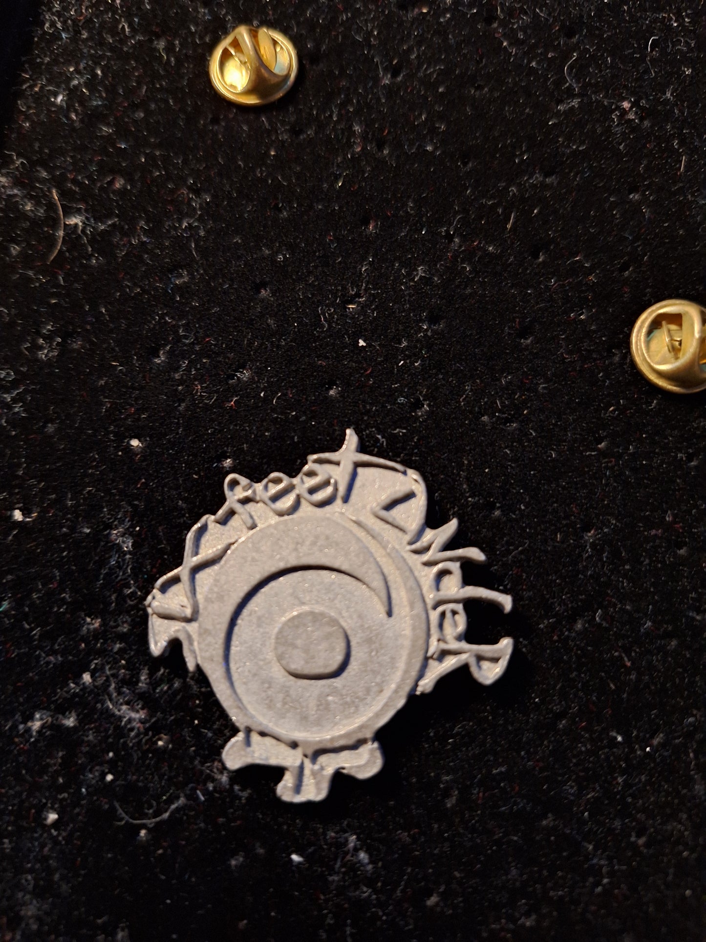 Six feet under badge