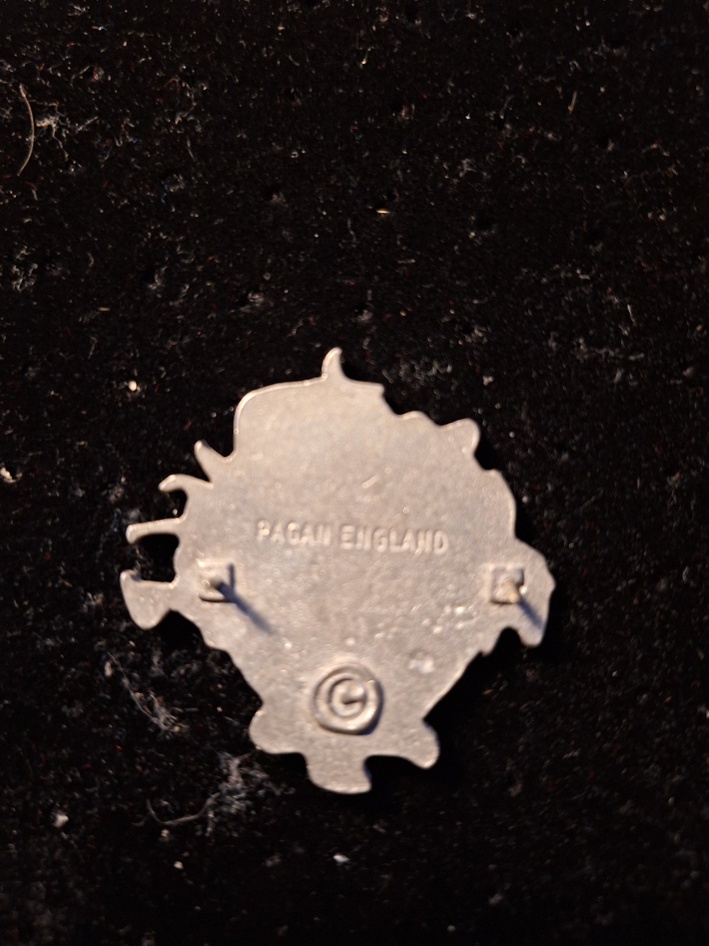 Six feet under badge