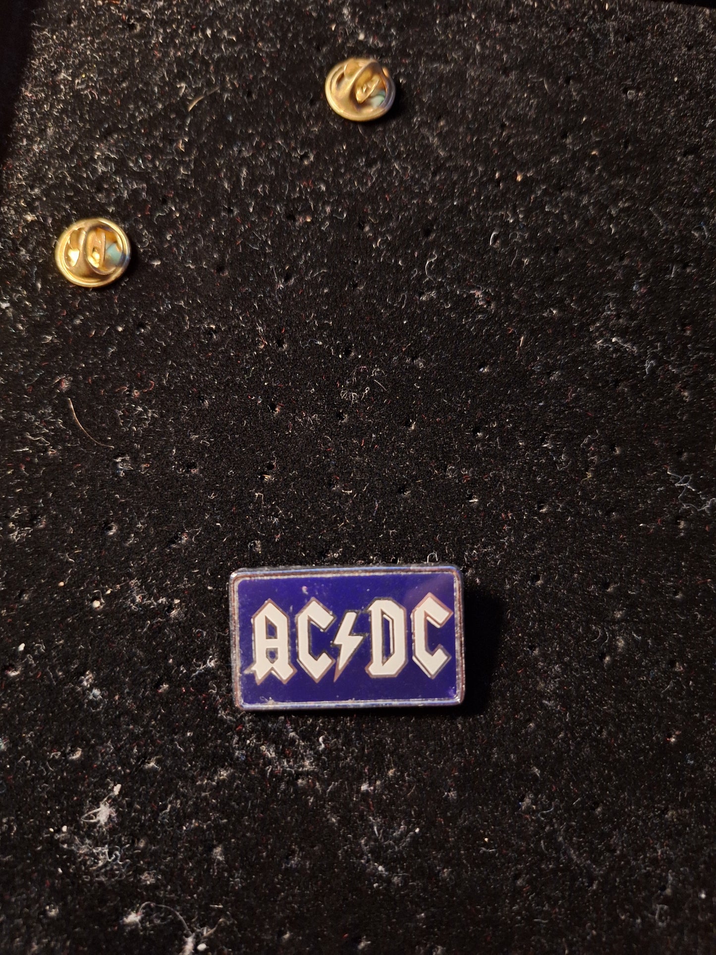 Acdc badge