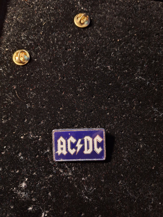 Acdc badge