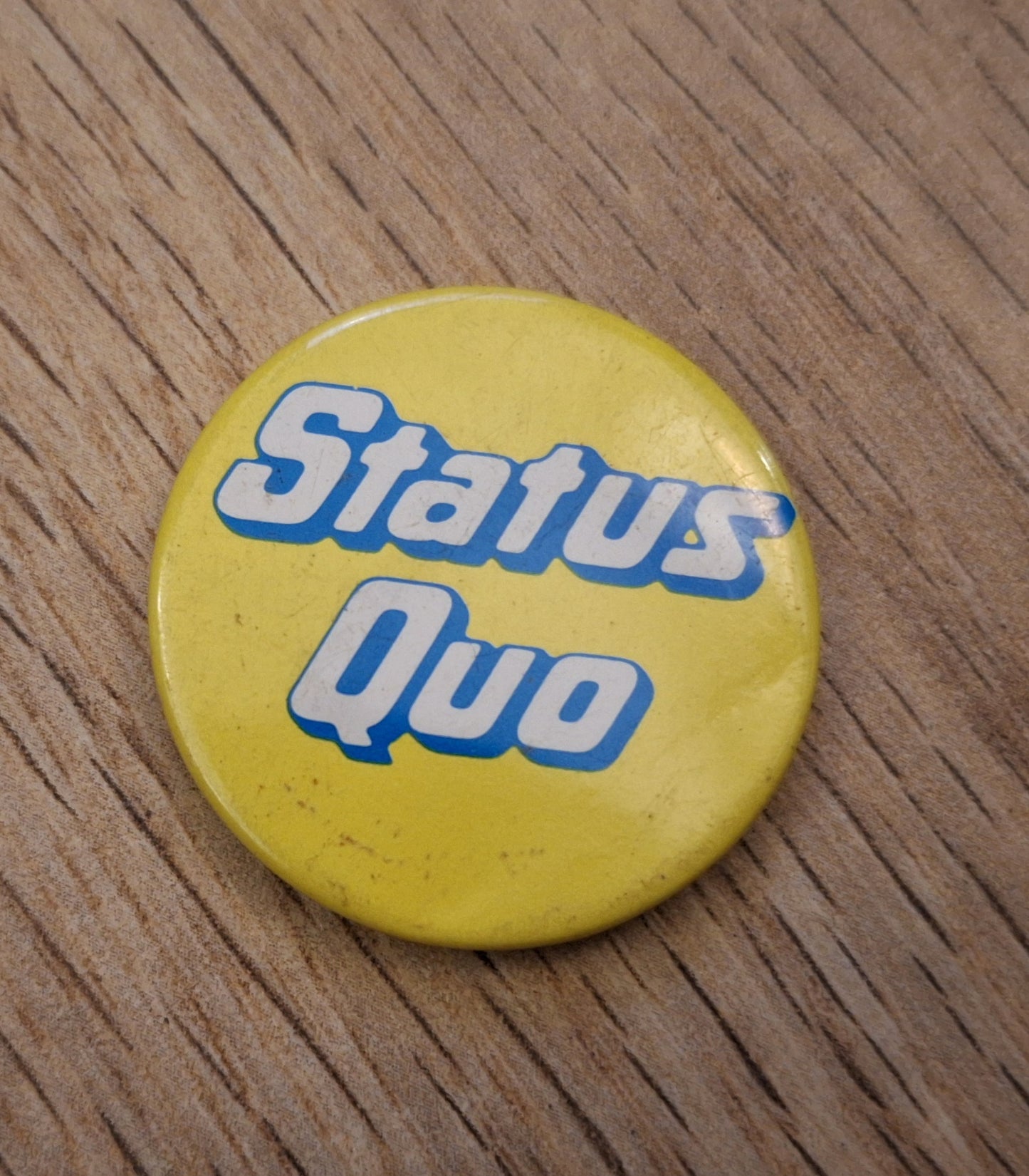 Status quo button 4