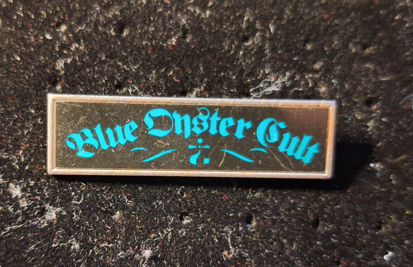 Blue ouster cult badge