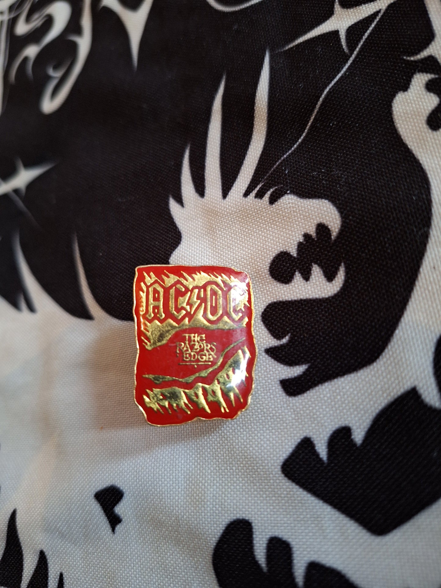 ACDC badge