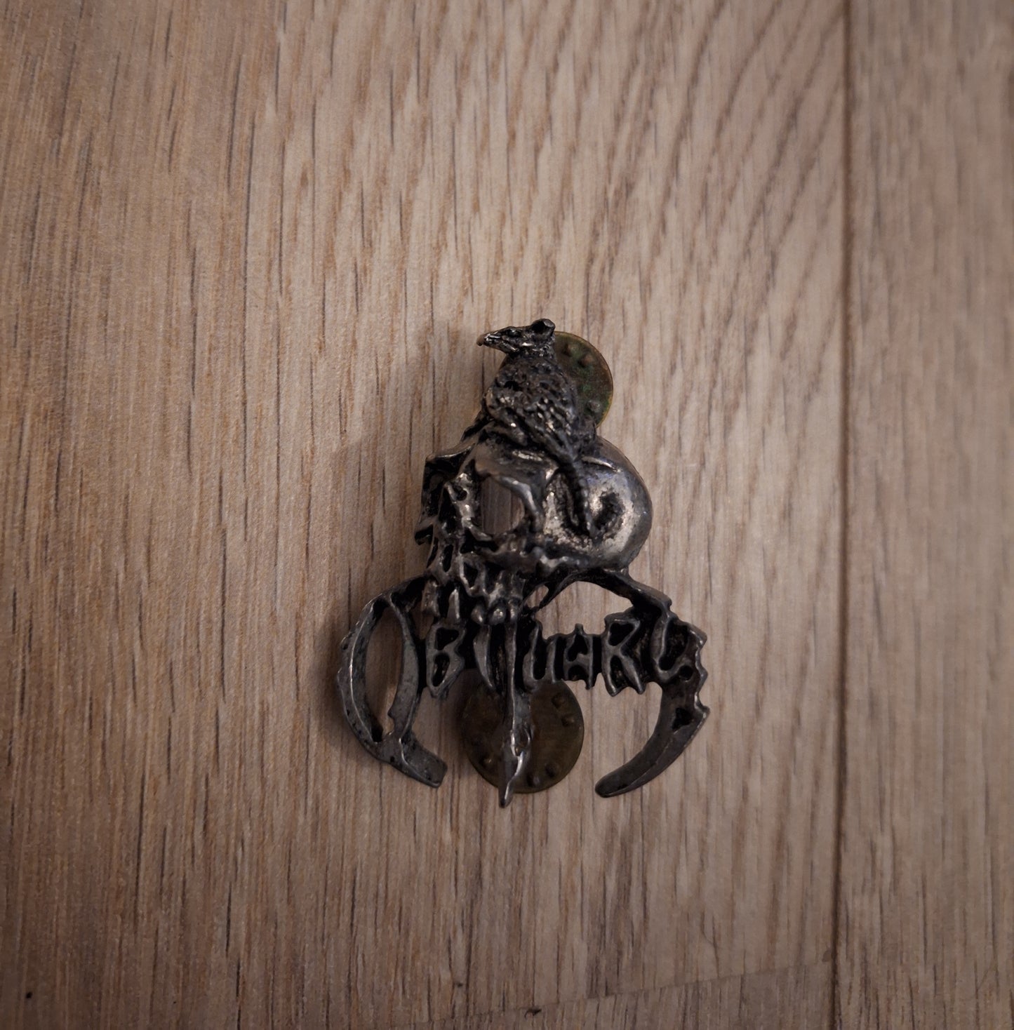 Obituary skull badge