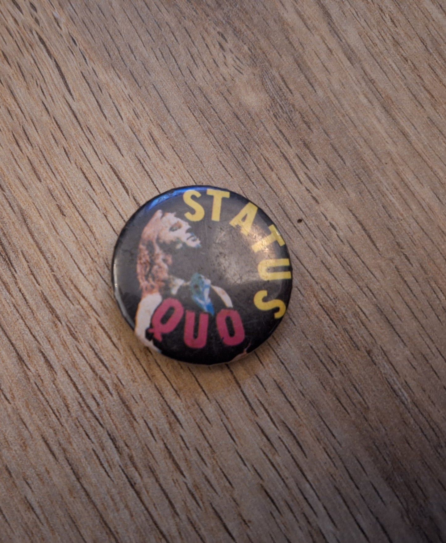 Status quo button 3