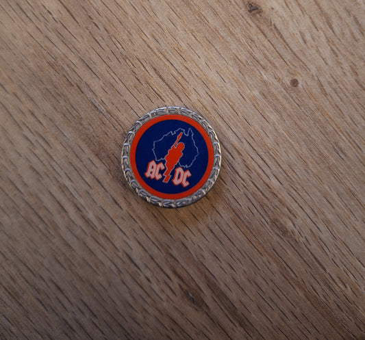 ACDC badge